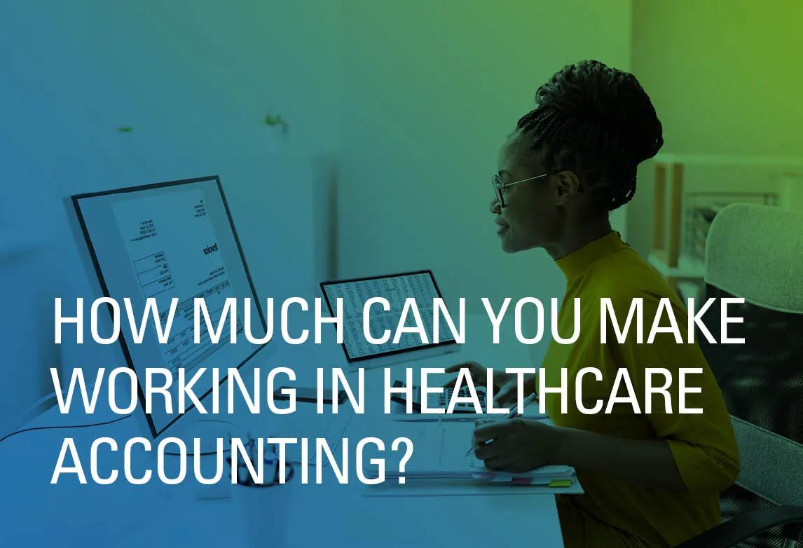 Healthcare accounting professional sitting at a desk and viewing a computer while using a calculator and writing down figures.