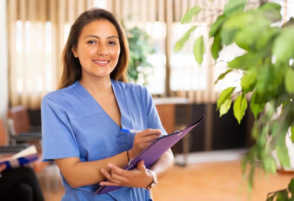 medical assistant working in a healthcare facility after completing a medical assistant training program