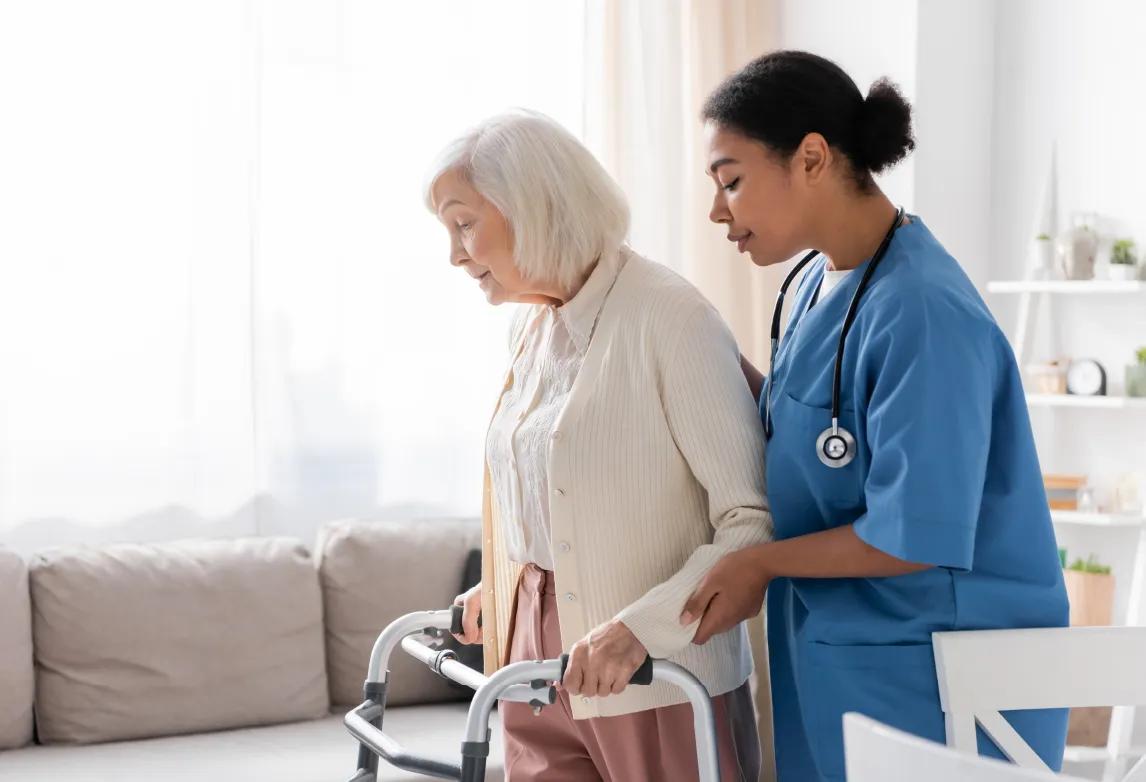 a nursing assistant taking care of patient