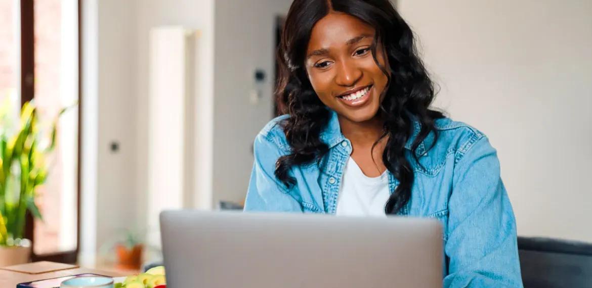 A woman sitting at a computer