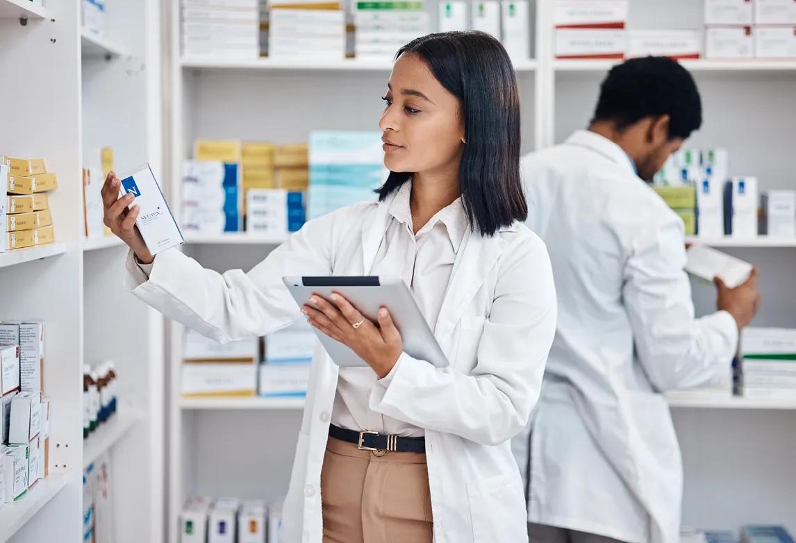 two pharmacy technicians working