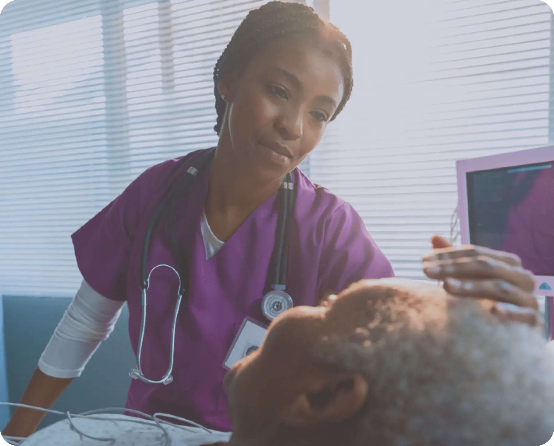 a woman taking care of an elderly patient